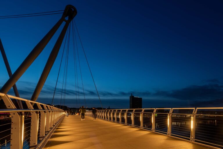 a well lit footbridge in Newport