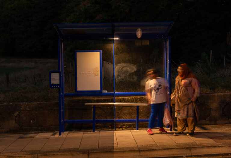 Luton bus stop half of the photograph has been dimmed to 50% of light output and the other half shows lighting at 100%